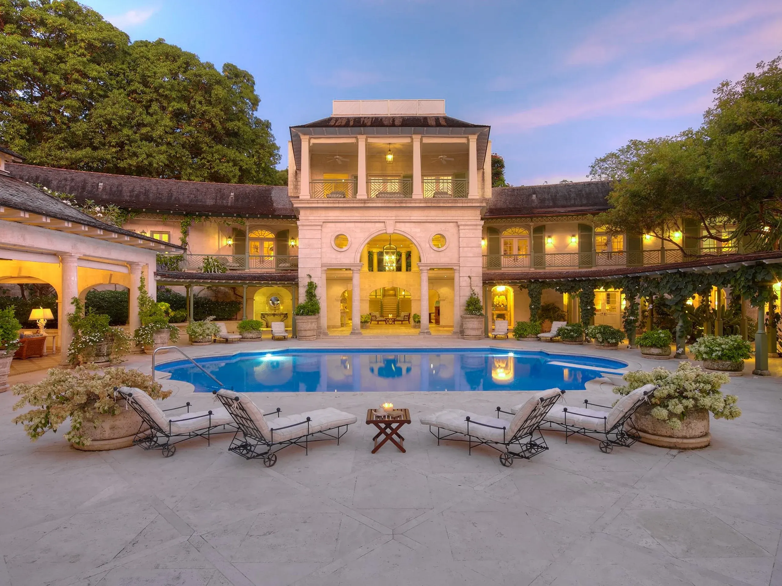 A courtyard pool at dusk on Barbados's west coast